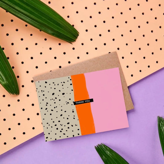 Postikortti Thank you tekstillä.