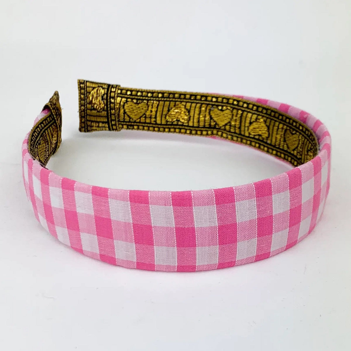 Hiuspanta Gignham pinkki alustalla.